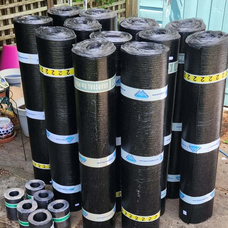 Torch-on roofing felt and lead delivered for a Weybridge flat roof repair